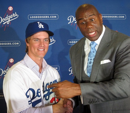 During Tuesday's press conference, Earvin "Magic" Johnson was asked why the Dodgers were spending money like it's going out of style. Johnson's answer was short, sweet and to the point - "We wanna win."(Photo credit - Ron Cervenka)