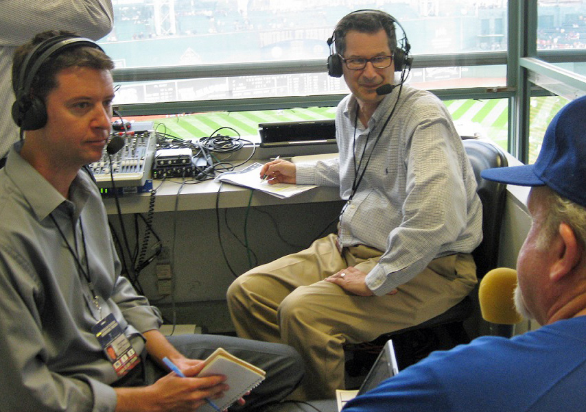 Former DodgerTalk Radio show hosts Josh Suchon (left) and Ken Levine (center) interview a Dodger fan at Fenway Park in 2010. (Photo credit Ron Cervenka)