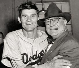 Roe is congratulated by Dodger GM Branch Rickey after winning game-2 of the 1949 World Series.(AP Photo)