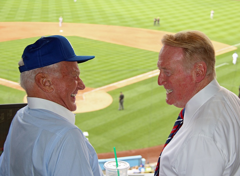Buzz Aldrin and Vin Scully share a moment on Memorial Day 2013 on which Aldrin threw out the ceremonial first pitch. (Photo credit - Ron Cervenka)