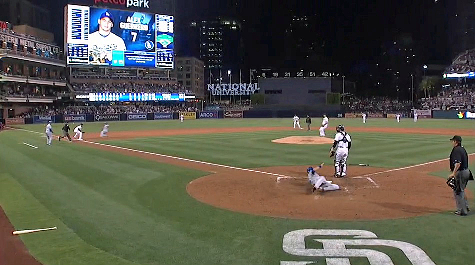 In this video capture (courtesy of SportsNet LA), you can clearly see Andre Ethier touching home plate as A.J. Ellis pulls up approaching third base. (Click on image to view video)