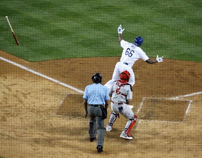 Not only is Puig back, but so is his signature bat flip. (Photo credit - Ron Cervenka - Click on image to view video)