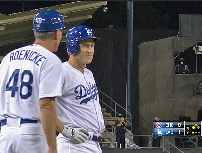 New Dodgers third base coach Ron Roenicke congratulates new Dodgers second baseman Chase Utley after the 13-year MLB veteran turned a double into a triple on Friday night. (Video capture courtesy of SportsNet LA - Click on image to view video)