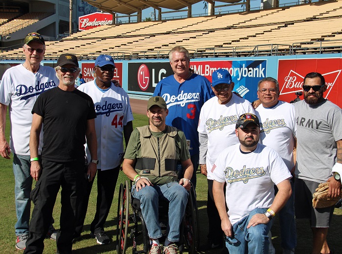 Former Dodger and Viet Nam veteran Roy Gleason (left) and former Dodger Al Downing (third from left) pose with a group of veterans on hand for Wednesday's Veterans Day Batting Practice event at Dodger Stadium. (Photo credit - Ron Cervenka)