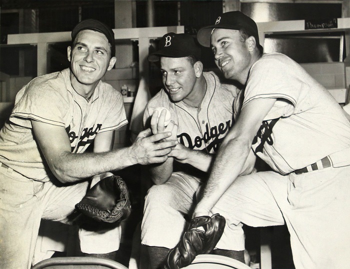 Jim Hughes (center) with Dodger greats Gil Hodges (left) and Duke Snider. (AP photo)