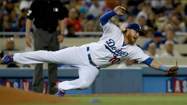 Even though Justin Turner has played exceptionally well at third base, is he a true everyday third baseman? (Photo credit - Luis Sinco)