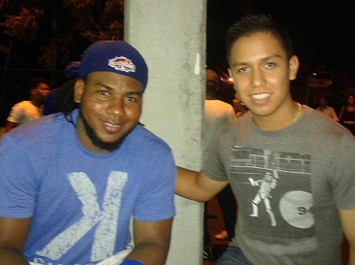 Current Dodgers pitcher Pedro Baez with 17-year-old Mexican pitching prospect Pedro Uriostegui talking baseball in the Dominican Republic. (Photo credit - Robb Anderson)