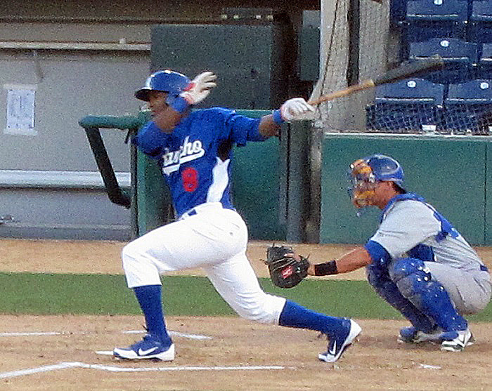 Yasiel Puig signed with the Dodgers on July 28, 2012 and blazed his way through the minor leagues. making his MLB debut less than one year later on June 3, 2013. (Photo credit - Ron Cervenka)