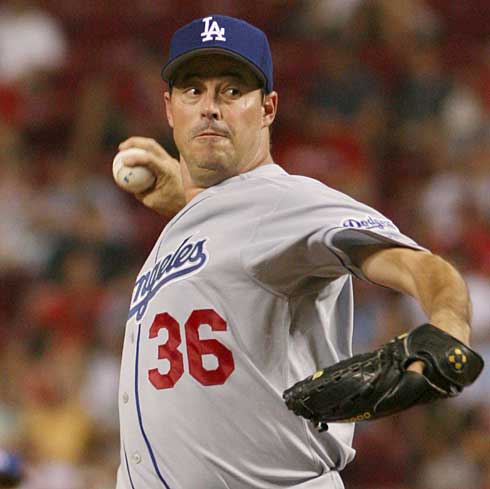 Although his time with the Dodgers was relatively short, Hall of Famer Greg Maddux was a huge fan-favorite. (Photo credit - Al Behrman)