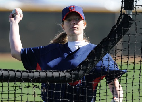 Justine Siegal made history on February 21, 2011 when she became the first female to ever throw batting practice to a major league team to the Cleveland Indians during spring training. She did so again on September 15, 2015 when she was hired by the Oakland A's as a coach. (Photo credit - Norm Hall)