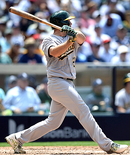 When you've had only three hits in 26 at-bats in your 11-year MLB career, it's difficult to find a photograph of one of them. Fortunately, USA Today's Jake Roth captured this one on June 16, 2015 against the San Diego Padres. It was an fifth-inning RBI single in an eventual 6-5 Athletics win.