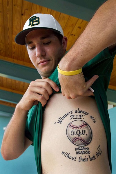 J.D. Underwood has his father's famous words tattooed on his left side. (Photo credit - Allen Eyestone)