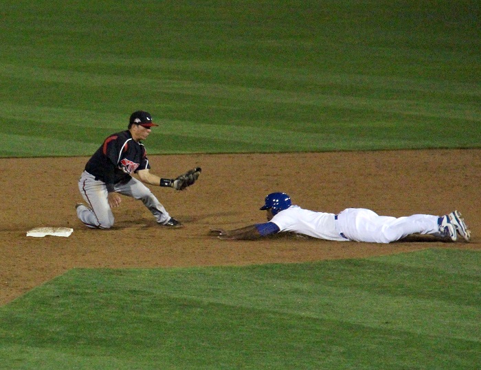 Although there were undoubtedly several Dodger fans holding their collective breaths when Kendrick attempted to steal second base on Thursday night, the veteran Dodgers infielder said that he had no issues whatsoever with his left calf. (Photo credit - Ron Cervenka)