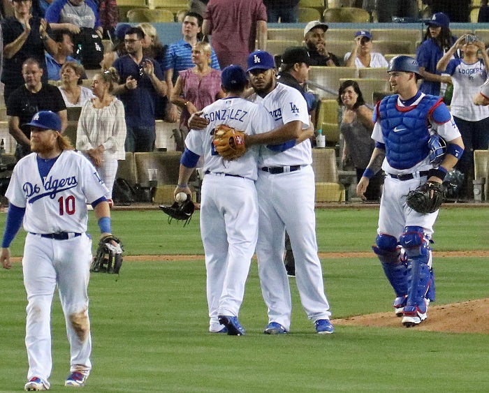 Dodgers first baseman Adrian Gonzalez congratulates Dodgers closer Kenley Jansen after the All-Star closer collected his franchise record-setting 162nd save on June 20 at Dodger Stadium. (Photo credit - Ron Cervenka)