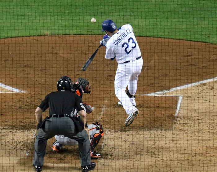With Giants outfielder Angel Pagan having gone 0 for 3 with a walk on Wednesday night, Dodgers first baseman Adrian Gonzalez now has the longest hitting streak in the majors at 17 after this fifth-inning single off of Giants right-hander Johnny Cueto on Wednesday night. (Photo credit - Ron Cervenka)