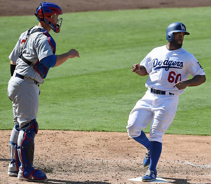 Dodgers right fielder Andrew Toles scored the only run in Sunday's exciting 1-0 Dodgers win to take two of three from the NL East first place Cubs. (Photo credit - Stephen Carr)