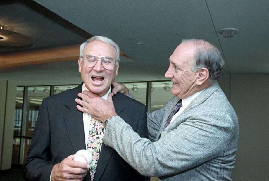 This Oct. 3, 1991 photo shows former Brooklyn Dodgers pitcher Ralph Branca pretending to choke former New York Giants slugger Bobby Thomson on the 40th anniversary of Thomson's famed 'Shot Heard 'Round the World on October 3, 1051. (Photo credit - Marty Lederhandler)