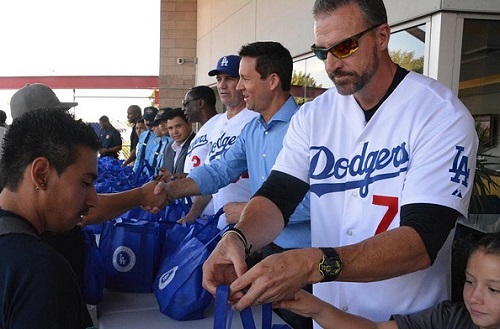 Last year members of the Dodgers alum handed out 11,000 Thanksgiving turkeys at the annual Turkey Giveaway and Health Fair. (Photo courtesy of LA Dodgers)